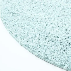 Round Rugs - Pastel (turquoise) -Viscose Rugs Shop pastellshaggy 300 softturkis rund nah.jpg